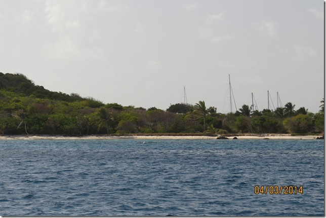 Petit Bateau from the Windward side, with yachts anchored behind in the cut