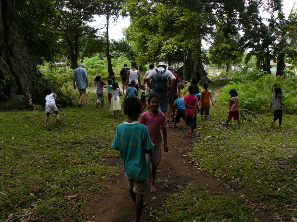 Visiting the nutmeg plantation - along with the village chioldren