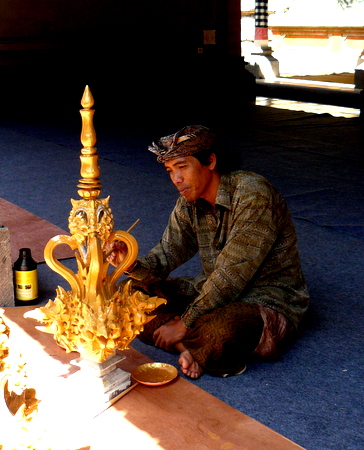 Painting the wooden carvings