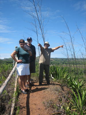 Our guide enthusiastically pointing out the sites to Ross and Sue of Y-Not.