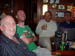 Ombord i Vindrek Fra venstre/From left. Odd (skipper), Torbjørn  (byssegutt), Harald (kokken), Nigel (skipsingeniør)