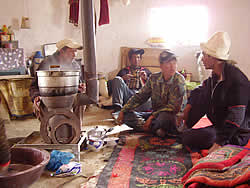 Zaire and friends gathered inside a local Kyrgyz yurt.