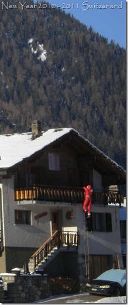 Santa climbing onto a terrce in Bruson!